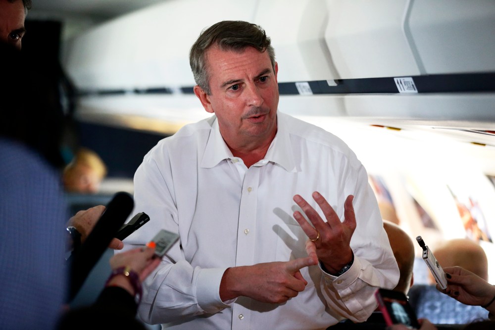Senior adviser Ed Gillespie briefs reporters as they accompany Mitt Romney to Weyers Cave, Va., Thursday, Oct. 4, 2012.