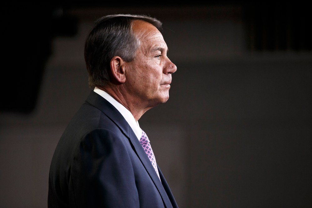 House Speaker John Boehner of Ohio meets with reporters on Capitol Hill in Washington, D.C., Dec. 4, 2014. (Photo by J. Scott Applewhite/AP)