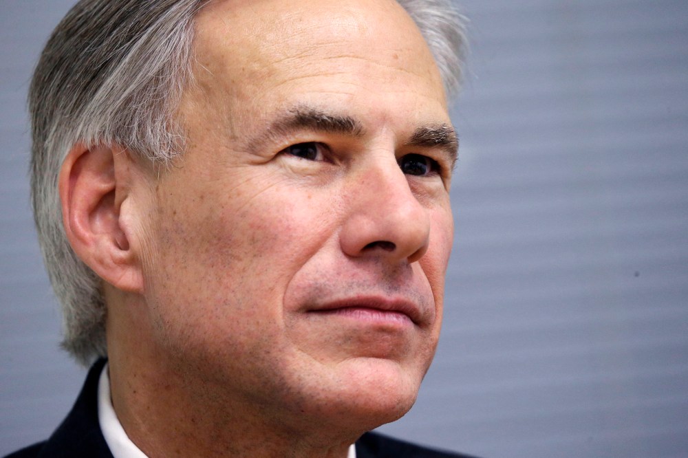 Texas Attorney General and gubernatorial candidate Greg Abbott listens during a meeting, Dec. 3, 2013, in Plano, Texas.