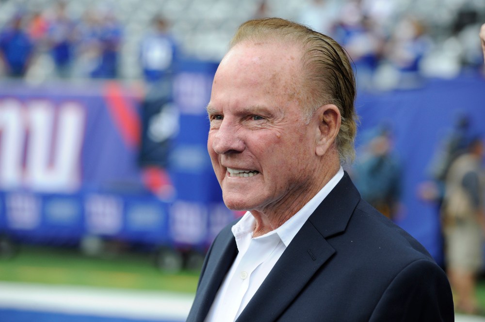 Former New York Giants player Frank Gifford looks on before an NFL football game between the New York Giants and the Denver Broncos, Sept. 15, 2013, in East Rutherford, N.J. (Photo by Bill Kostroun/AP)