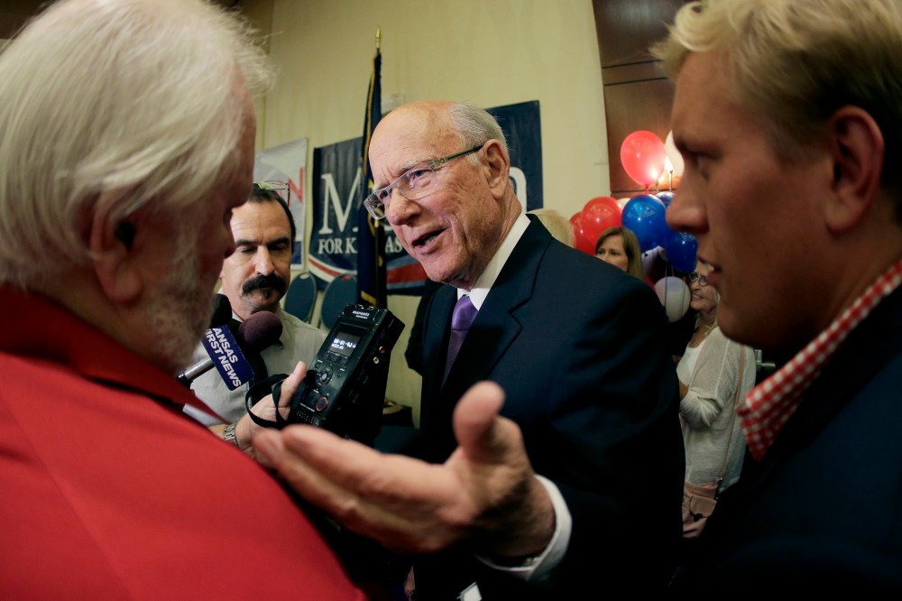U.S. Sen. Pat Roberts talks to the media after making his victory speech at an election watch party, Aug. 5, 2014, in Overland Park, Kan.