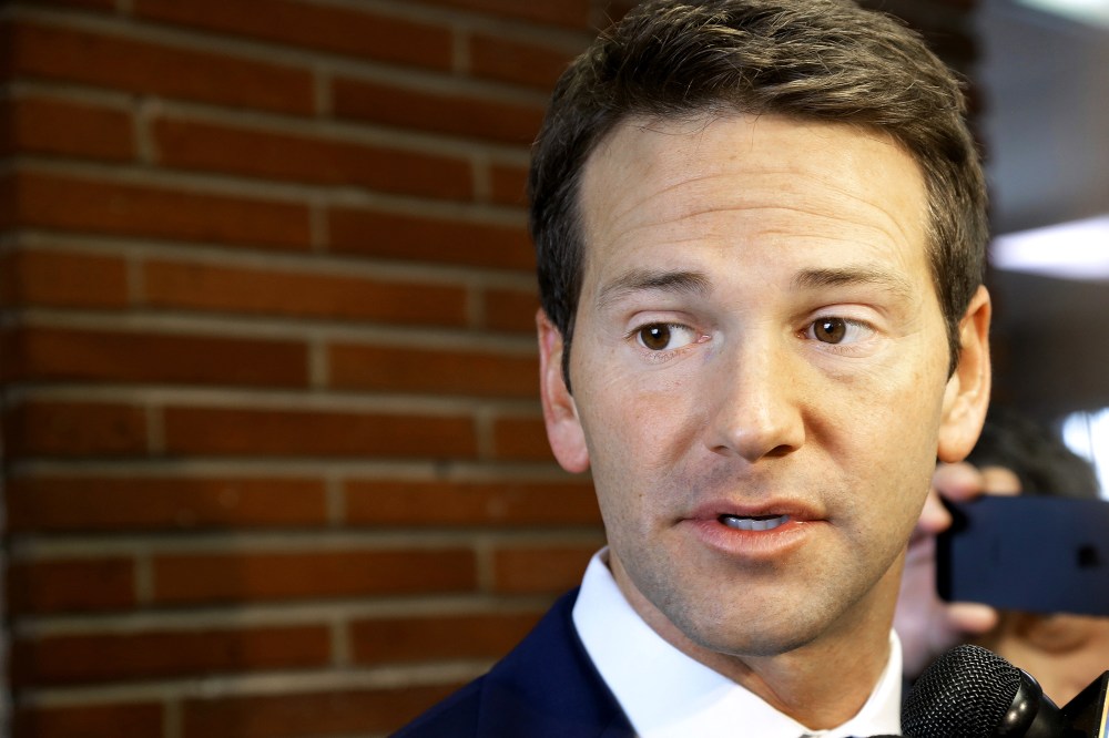 In this Feb. 6, 2015 file photo, Rep. Aaron Schock, R-Ill. speaks to reporters in Peoria Ill. (Photo by Seth Perlman/AP)