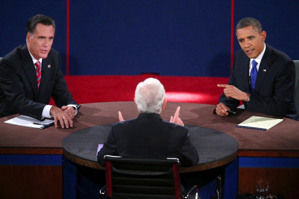 Republican presidential nominee Mitt Romney and President Barack Obama answer a question during the third presidential debate at Lynn University, Monday, Oct. 22, 2012, in Boca Raton, Fla. (AP Photo/Pool-Win McNamee)