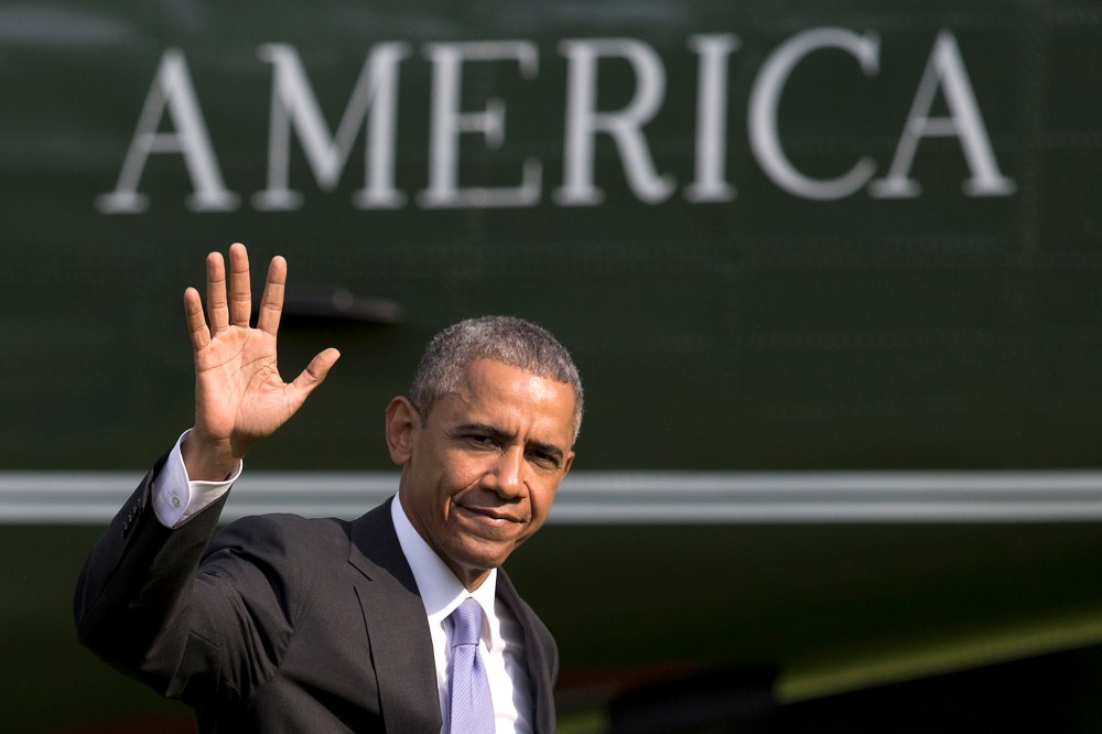 President Barack Obama waves as he walks across the South Lawn of the White House from Marine One, May 28, 2015, in Washington, D.C. (Photo by Carolyn Kaster/AP)