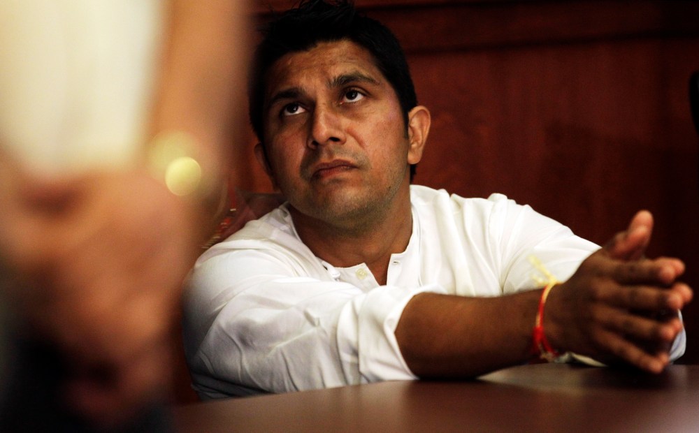 Amardeep Kaleka, son of the president of Sikh Temple of Wisconsin Satwant Kaleka, watches a news conference, Monday, Aug. 6, 2012, in Oak Creek, Wisconsin.