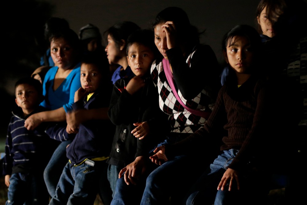 A group of undocumented immigrants from Honduras and El Salvador who crossed the U.S.-Mexico border are stopped in Granjeno, Texas on June 25, 2014.