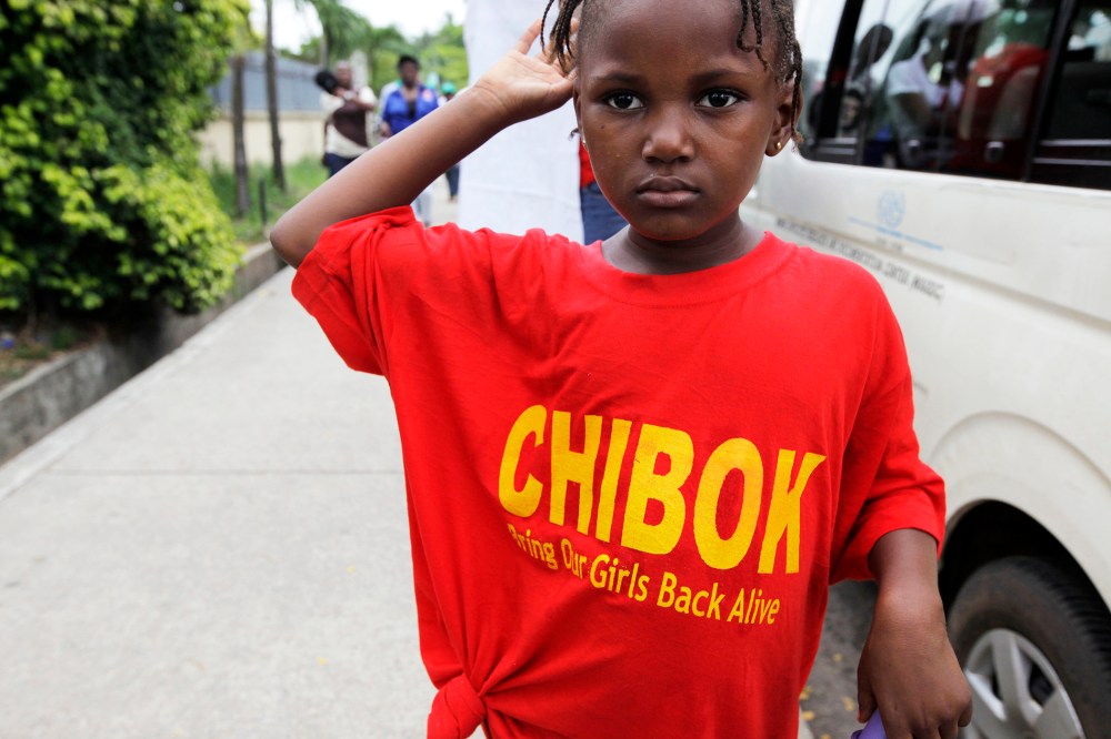A girl attends a demonstration calling on the government to rescue kidnapped girls from a Chibok secondary school, during a workers day celebration in Lagos, Nigeria, May, 1. 2014.