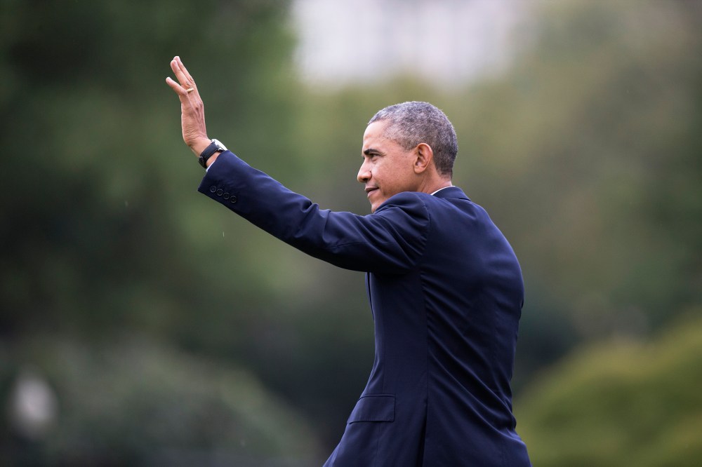 President Barack Obama waves as he walks across the South Lawn of the White House in Washington on Oct. 7, 2014. (Carolyn Kaster/AP)