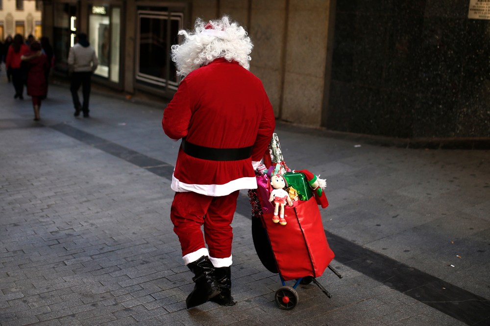 A man dressed as Santa Claus in Madrid, Spain on Dec. 1, 2013.
