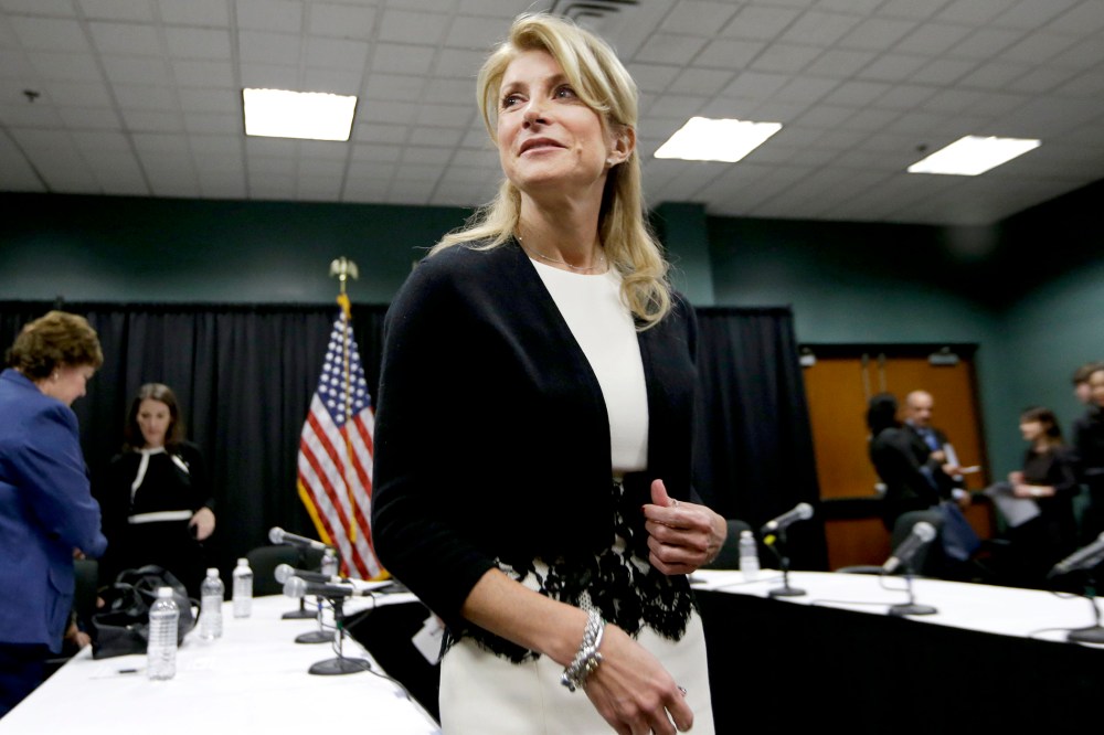 Wendy Davis speaks to reporters after an education roundtable meeting in Arlington, Texas, Jan. 9, 2014.