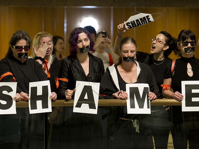 Lenell Ripley, second from left, cries as she demonstrates with other abortion rights supporters outside the Capitol auditorium in Austin, Texas, Thursday July 18, 2013.   (Photo by Jay Janner/Austin American-Statesman/AP)