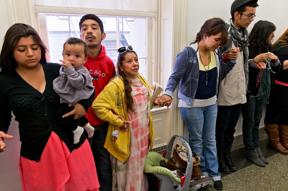 A group of young people from Arizona with undocumented parents gather outside the office of House Speaker John Boehner of Ohio, Tuesday, Oct. 22, 2013