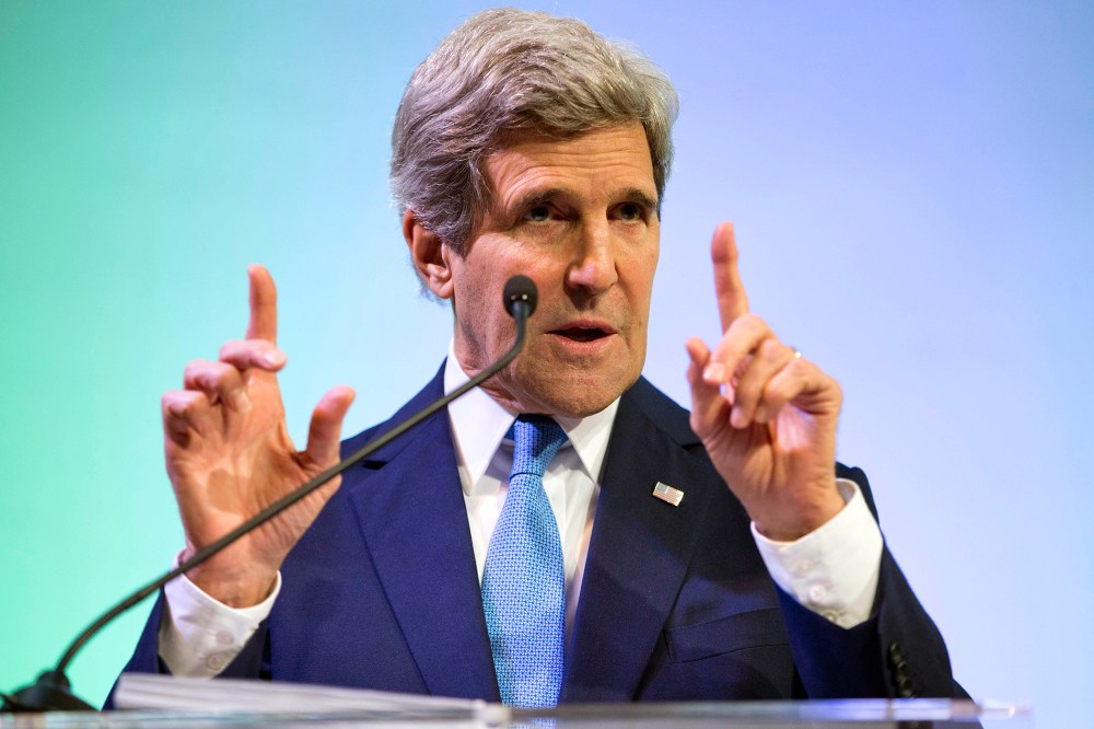 Secretary of State John Kerry gestures during a speech on climate change, Feb. 16, 2014.