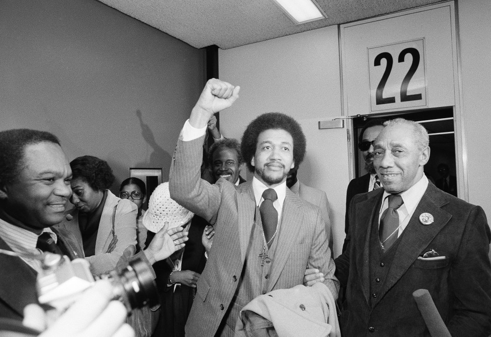 The Rev. Benjamin  Chavis gives a clenched fist salute on December 14, 1979, after being paroled by then-North Carolina governor Jim Hunt. Chavis, one of the Wilmington 10 defendants, was pardoned on Monday by North Carolina's current governor, Bev...