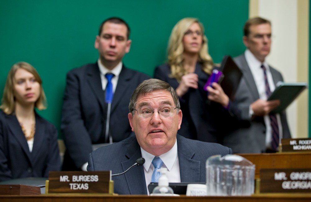Rep. Michael C. Burgess, R-Texas, questions Health and Human Services Secretary Kathleen Sebelius as she testifies before the House Energy and Commerce Committee on Capitol Hill in Washington, Wednesday, Oct. 30, 2013.