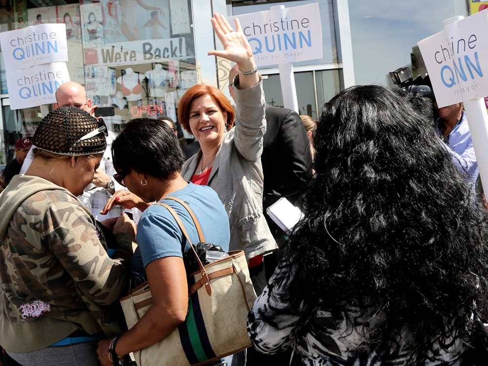 New York City Democratic mayoral hopeful and City Council Speaker Christine Quinn, center, waves at supporters during a campaign stop in the Bronx borough of New York, Thursday, Sept. 5, 2013.