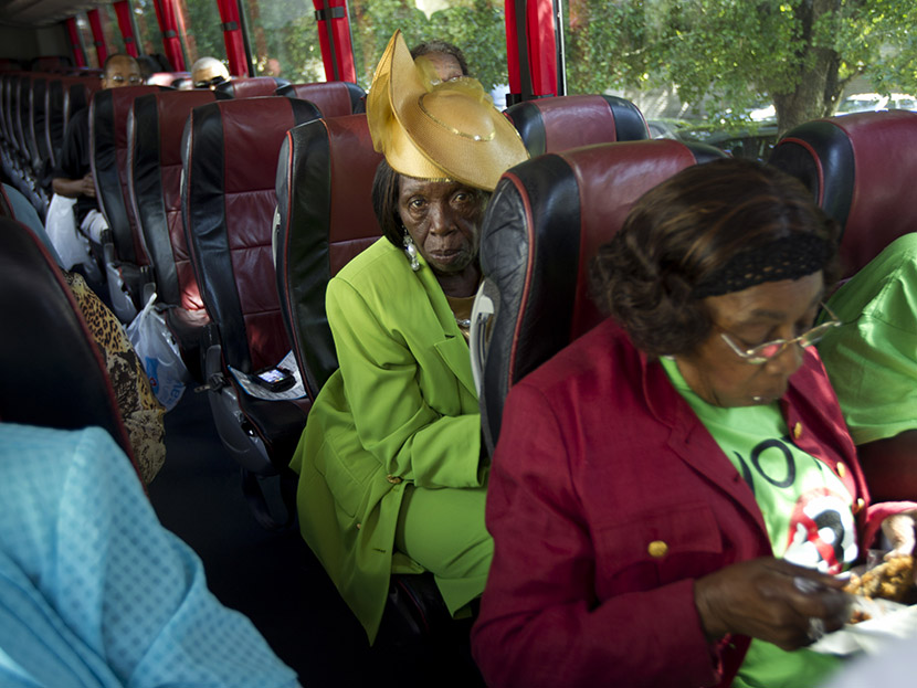 Martha Frazier rides a bus to a "Souls to the Polls" rally in Miami, Sunday, Oct. 28, 2012.  (Photo by J. Pat Carter/AP)