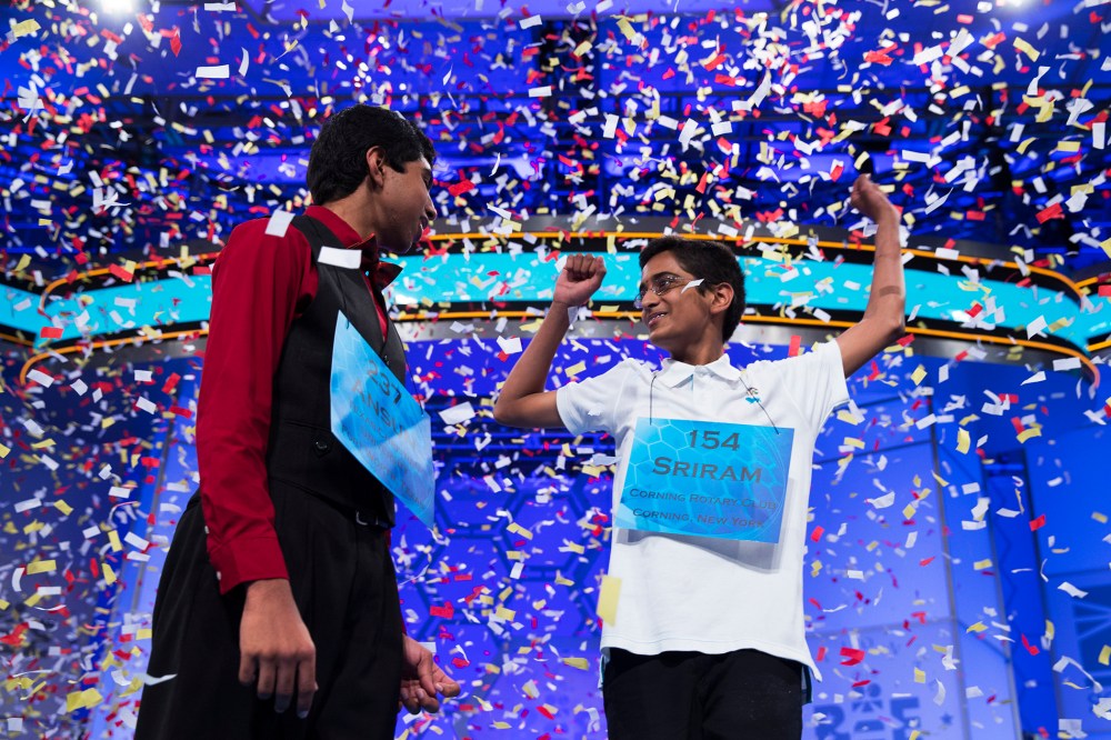 Ansun Sujoe, 13, of Fort Worth, Texas, left, and Sriram Hathwar, 14, of Painted Post, N.Y., celebrate after being named co-champions of the National Spelling Bee, May 29, 2014, in Oxon Hill, Md.