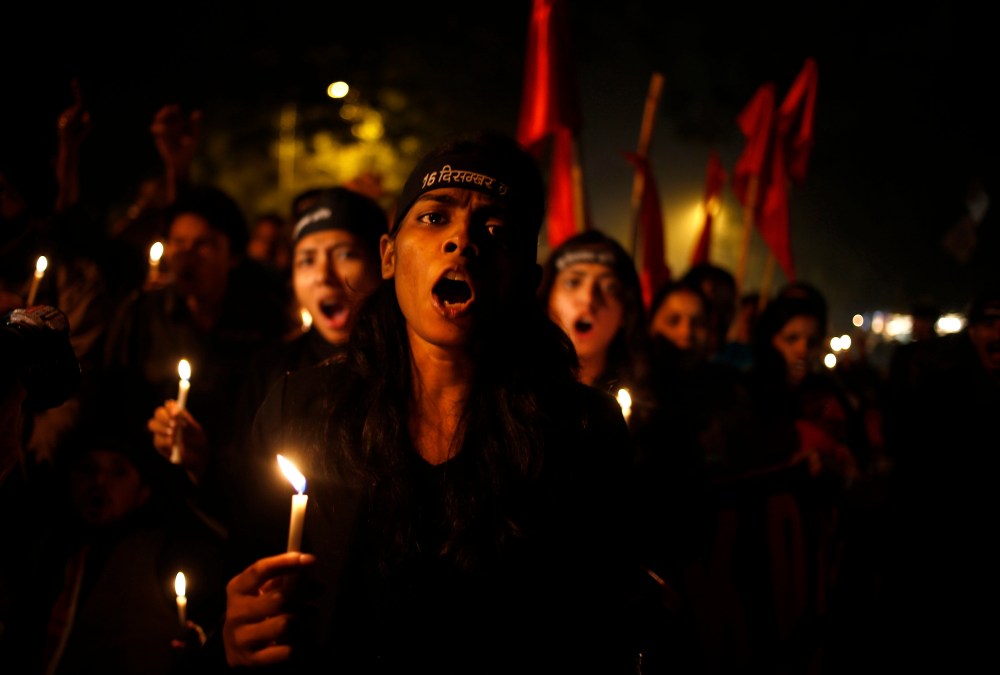 Indians take out a candle light vigil on the first anniversary of the brutal rape and murder of a young student in New Delhi, India, Dec. 16, 2013.