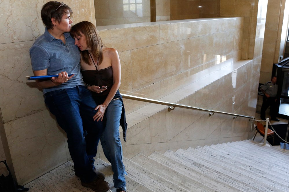 Pat Cline, left, and Patty McKenzie wait to get married at the Milwaukee County Courthouse June 6, 2014, in Milwaukee, Wis.