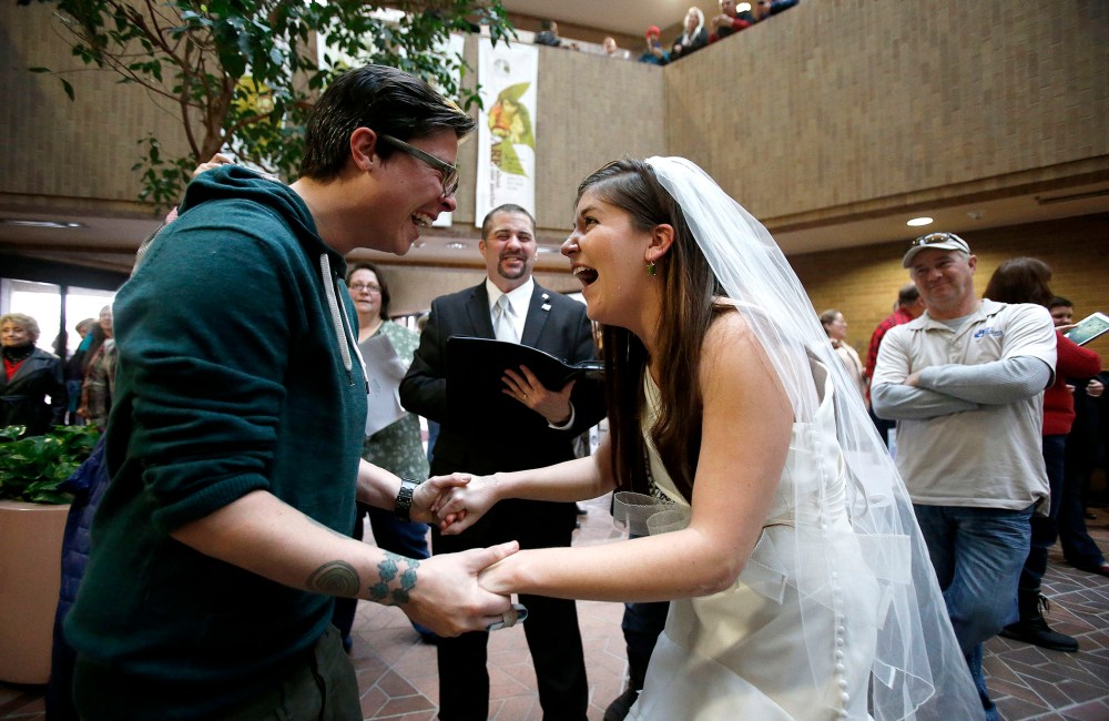 Jax and Heather Collins get married at the Salt Lake County clerk's office, Dec 23, 2013.