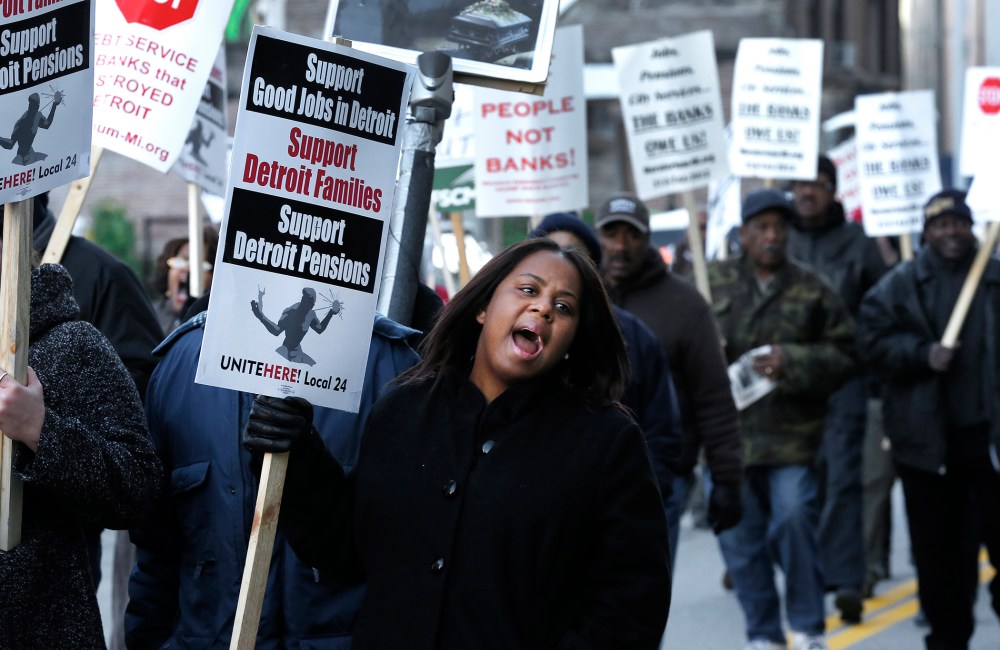 Jalita Shabazz joins protesters during a rally outside The Theodore Levin United States Courthouse in Detroit, Wednesday, Oct. 23, 2013.