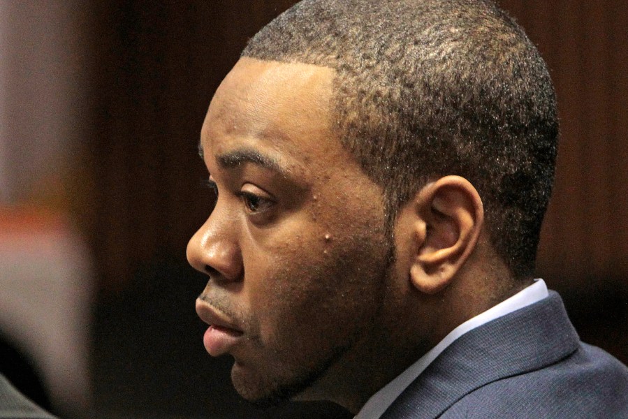 Murder defendant Courtney Lockhart listens during opening statements, Nov. 12, 2010 in his capital murder trial in Opelika, Ala. (Photo by Dave Martin/AP)