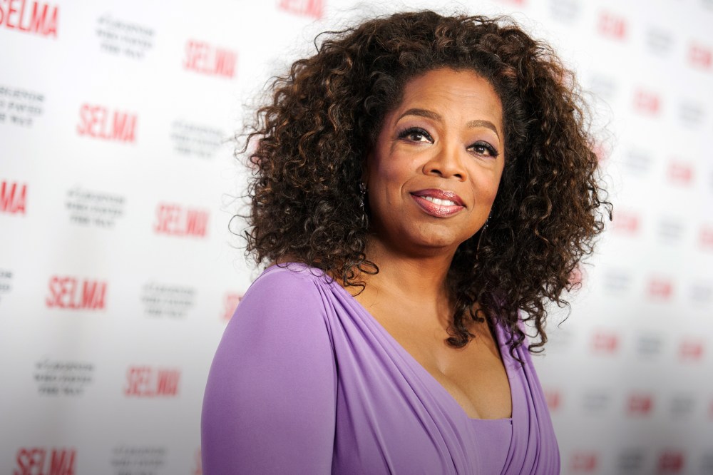In this Dec. 6, 2014 file photo, Oprah Winfrey arrives at Selma And The Legends That Paved The Way Gala in Goleta, Calif. (Photo by Richard Shotwell/Invision/AP)