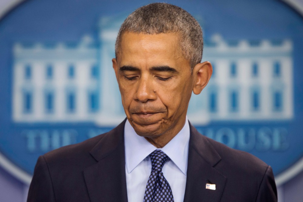 President Barack Obama pauses as he speaks about the massacre at a Orlando nightclub during a news conference at the White House in Washington, D.C., June 12, 2016. (Photo by Pablo Martinez Monsivais/AP)