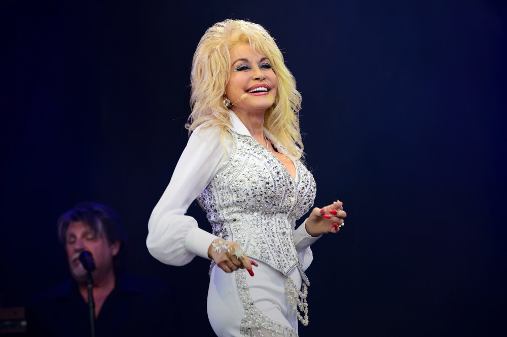 In this June 29, 2014 file photo, singer Dolly Parton performs at Glastonbury music festival, in England. (Photo by Jonathan Short/Invision/AP)