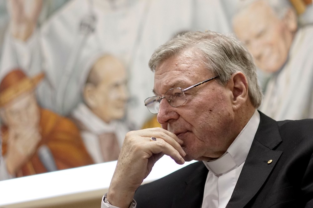 In this Tuesday, March 31, 2015 filer, Cardinal George Pell attends a press conference at the Vatican Radio headquarters, in Rome. (Photo by Andrew Medichini/AP)