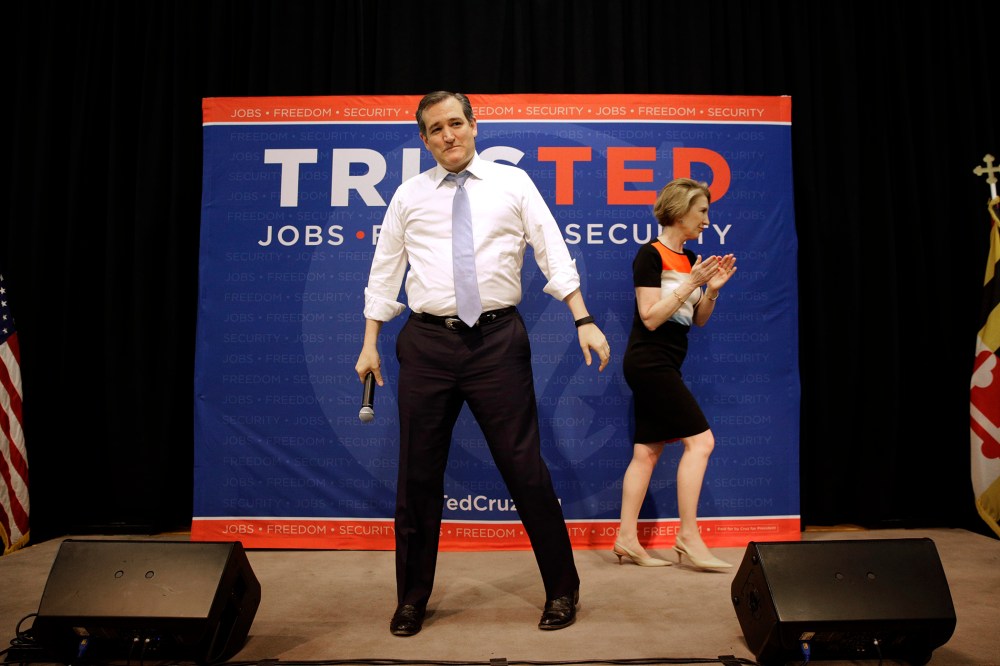 Republican presidential candidate, Sen. Ted Cruz, R-Texas stands onstage after being introduced by former candidate Carly Fiorina, during a rally in Towson, Md., April 18, 2016. (Photo by Patrick Semansky/AP)