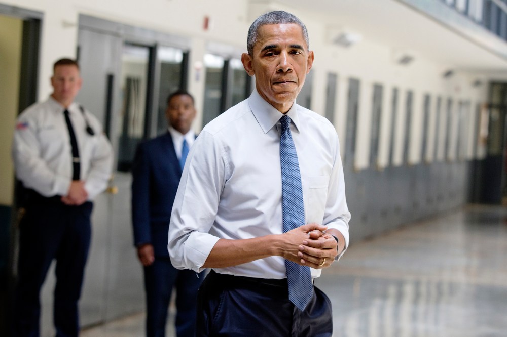 President Barack Obama pauses as he speaks at the El Reno Federal Correctional Institution, Okla., July 16, 2015. (Photo by Evan Vucci/AP)