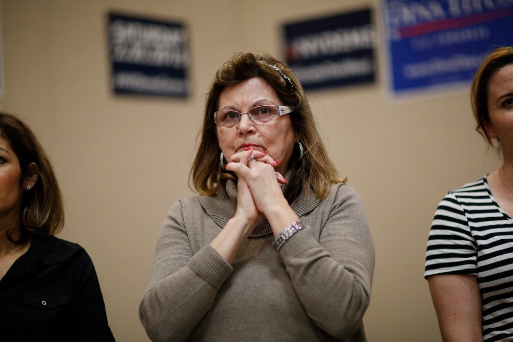 Teresa Parraga listens during a Latino get-out-the-caucus event, Feb. 16, 2016, in Las Vegas. (Photo by John Locher/AP)