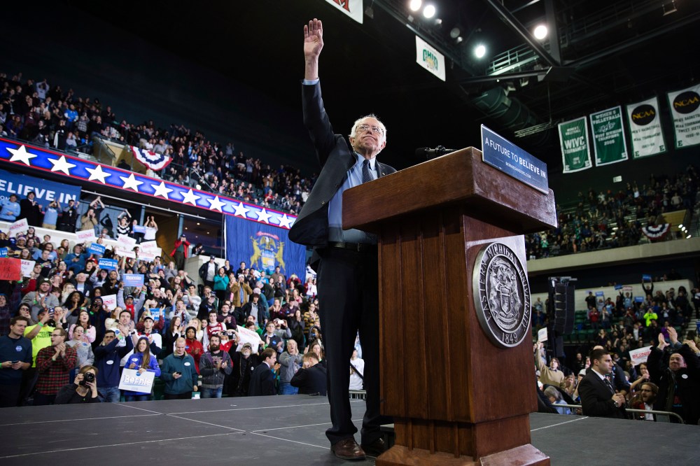 Democratic presidential candidate Sen. Bernie Sanders, I-Vt., waves during a rally at Eastern Michigan University, Feb. 15, 2016, in Ypsilanti, Mich. (Photo by Evan Vucci/AP)