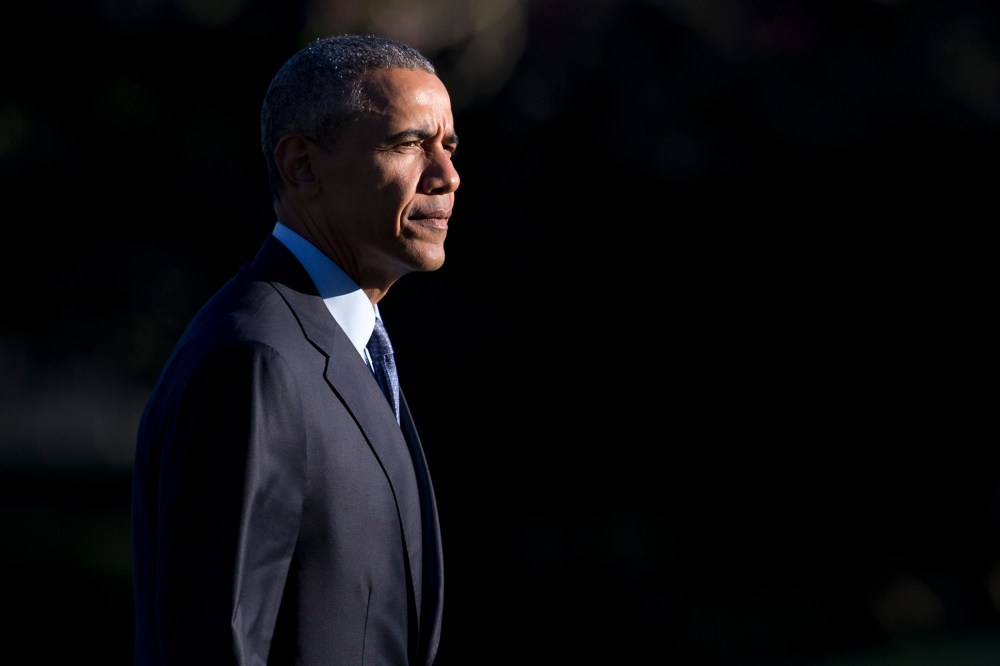 President Barack Obama walks across the South Lawn of the White House from Marine One, March 29, 2016, in Washington, D.C. (Photo by Carolyn Kaster/AP)