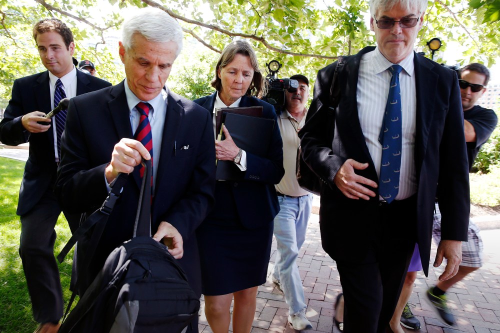 Members of Dzhokhar Tsarnaev's defense team leave federal court in Boston after their client was formally sentenced to death, June 24, 2015. (Photo by Michael Dwyer/AP)