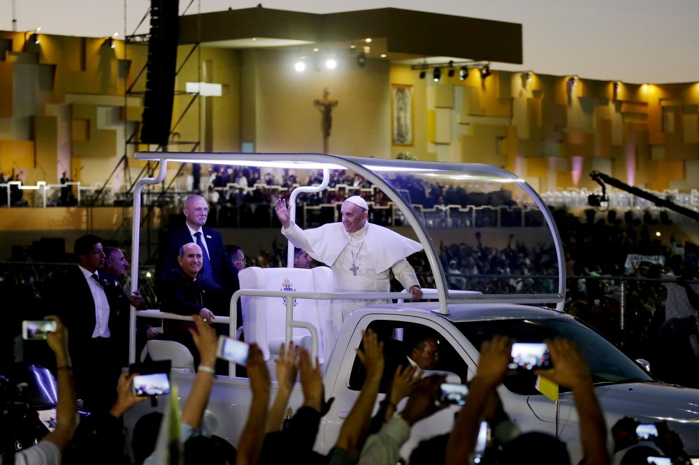 Pope Francis waves from his popemobile as he leaves the fairgrounds in Ciudad Juarez, Mexico, Feb. 17, 2016, where he celebrated an outdoor Mass. (Photo by Gregory Bull/Reuters)