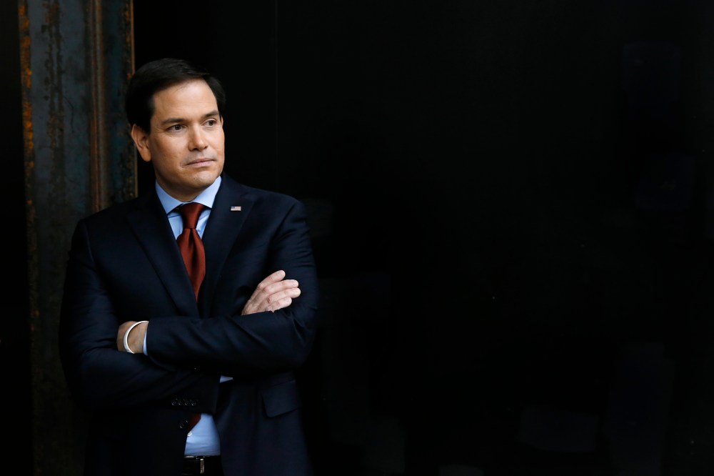 Republican presidential candidate Sen. Marco Rubio waits to speak at a caucus site on Feb. 1, 2016 in Clive, Iowa. (Photo by Paul Sancya/AP)
