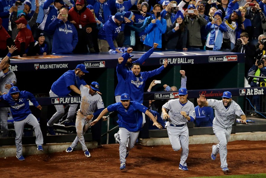 The Kansas City Royals celebrate after Game 5 of the Major League Baseball World Series against the New York Mets Monday, Nov. 2, 2015, in New York, N.Y. (Photo by Frank Franklin II/AP)