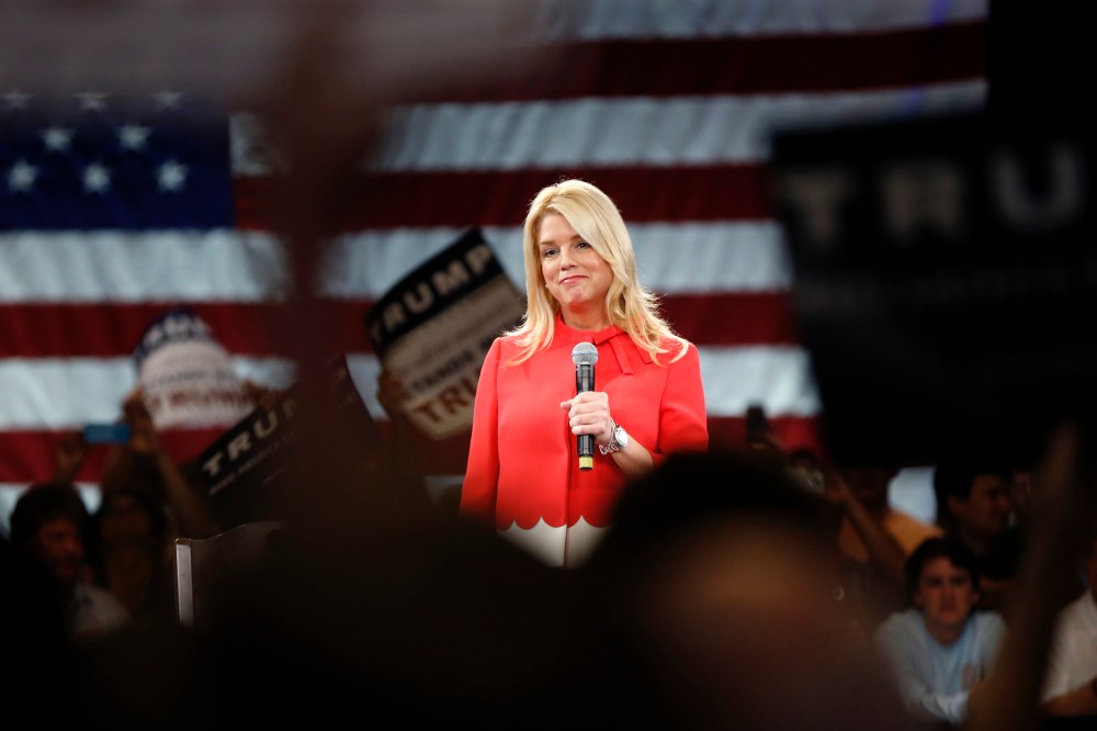 Fla. Attorney General Pam Bondi makes introductory remarks for Republican presidential candidate Donald Trump, before Trump arrives at a campaign event in Tampa, Fla. on March 14, 2016. (Photo by Gerald Herbert/AP)