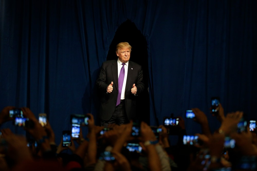 Republican presidential candidate Donald Trump arrives for a caucus night rally, Feb. 23, 2016, in Las Vegas. (Photo by Jae C. Hong/AP)