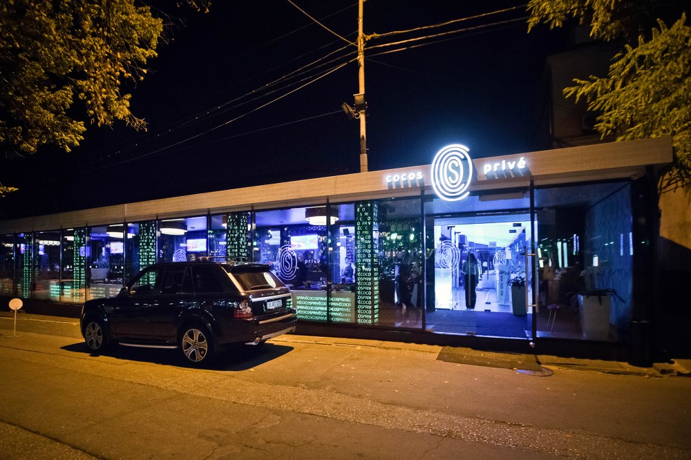 In this Oct. 5, 2015 photo, an imported luxury SUV is parked outside the Cocos Prive club in Chisinau, Moldova. (Photo by AP)