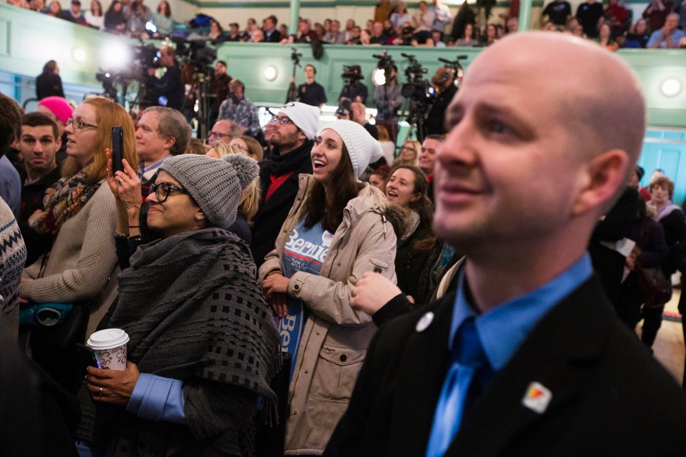Attendees laugh as Democratic presidential candidate, Sen. Bernie Sanders, I-Vt. speaks during a campaign stop at Exeter Town Hall, Feb. 5, 2016, in Exeter, N.H. (Photo by John Minchillo/AP)