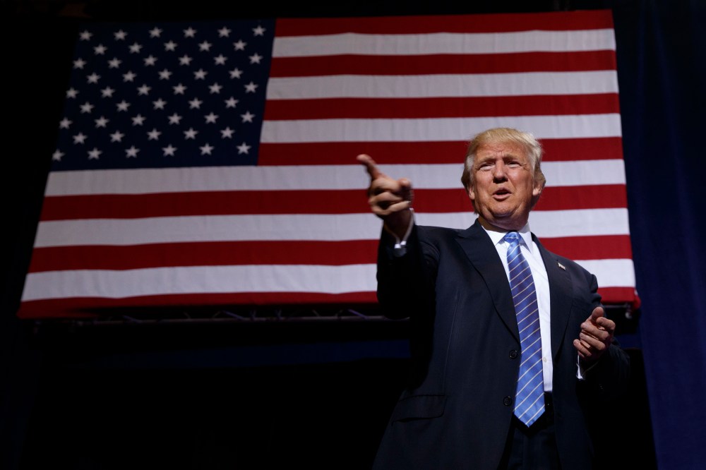 Republican presidential candidate Donald Trump arrives to deliver an immigration policy speech during a campaign rally at the Phoenix Convention Center, Aug. 31, 2016, in Phoenix. (Photo by Evan Vucci/AP)