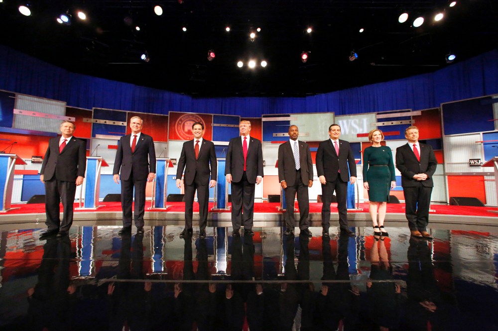 Republican presidential candidates John Kasich, Jeb Bush, Marco Rubio, Donald Trump, Ben Carson, Ted Cruz, Carly Fiorina and Rand Paul take the stage before the Republican presidential debate, Nov. 10, 2015, in Milwaukee. (Photo by Jeffrey Phelps/AP)