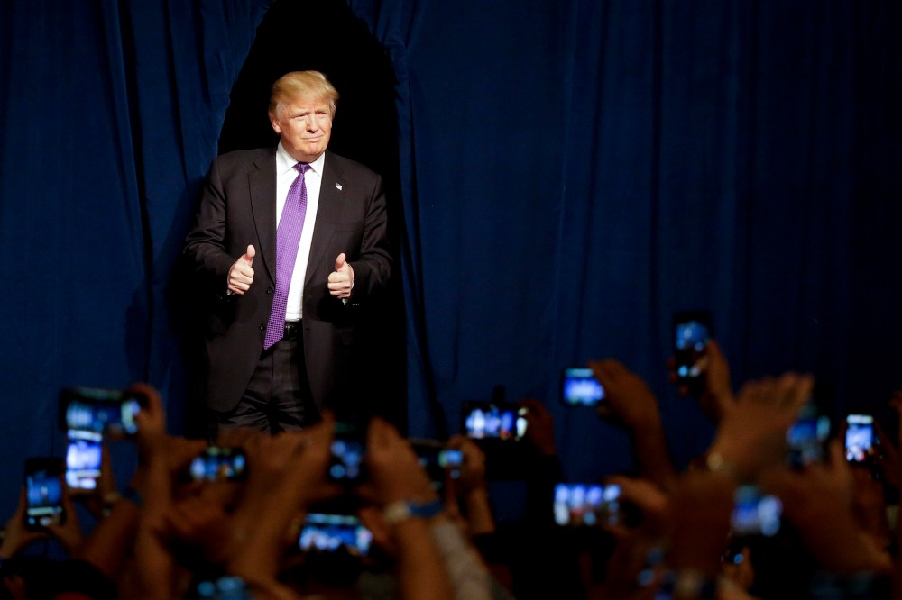 Republican presidential candidate Donald Trump arrives for a caucus night rally, Feb. 23, 2016, in Las Vegas, Nev. (Photo by Jae C. Hong/AP)