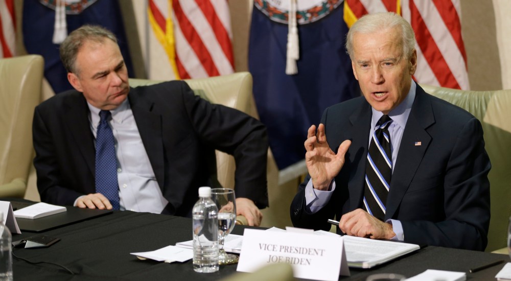 Sen. Tim Kaine, D-Va. listens at left as Vice President Joe Biden gestures during a round table discussion on gun violence at Virginia Commonwealth University in Richmond, Va., Friday, Jan. 25, 2013.  The panelists included officials who worked on the...