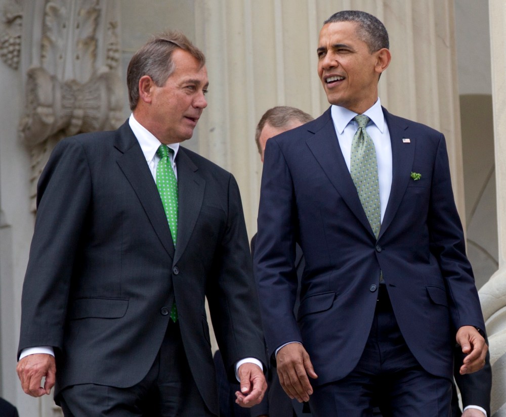 FILE - This March 20, 2012 file photo shows House Speaker John Boehner of Ohio and President Barack Obama walk down the steps of the Capitol in Washington. The people of an intensely divided nation just created a government that looks the same way as...