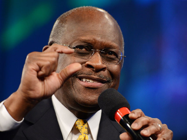 Former candidate for the Republican nomination in the 2012 US presidential election Herman Cain speaks at a Tea Party Unity Rally at The River at Tampa Bay Church in Tampa, Florida. (AFP PHOTO / ROBYN BECK)